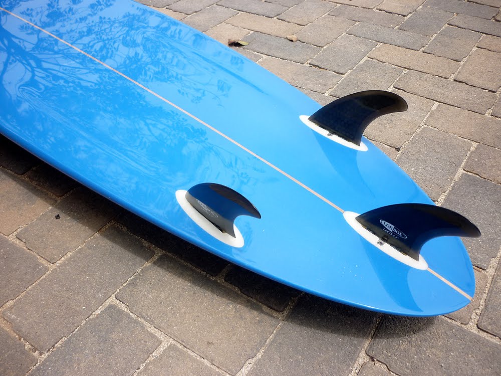 tri-fin surfboard