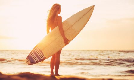 girl-surfboard-surfing-beach