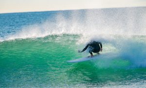 Surfer Rides