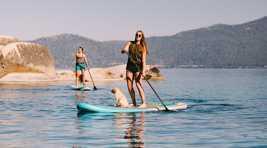  two girls on Stand-up paddle board