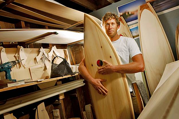 Danny Hess with Wooden Surfboard