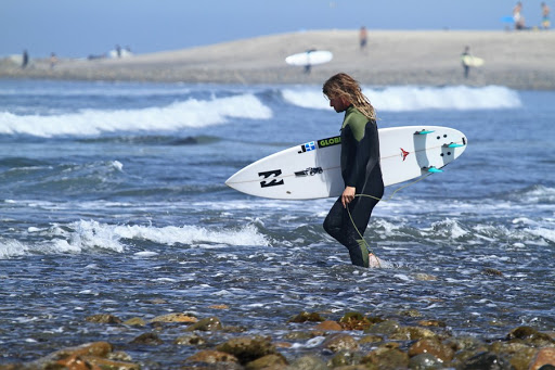 surfer with js occy board