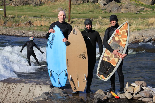 surfers with sculpt surfboards