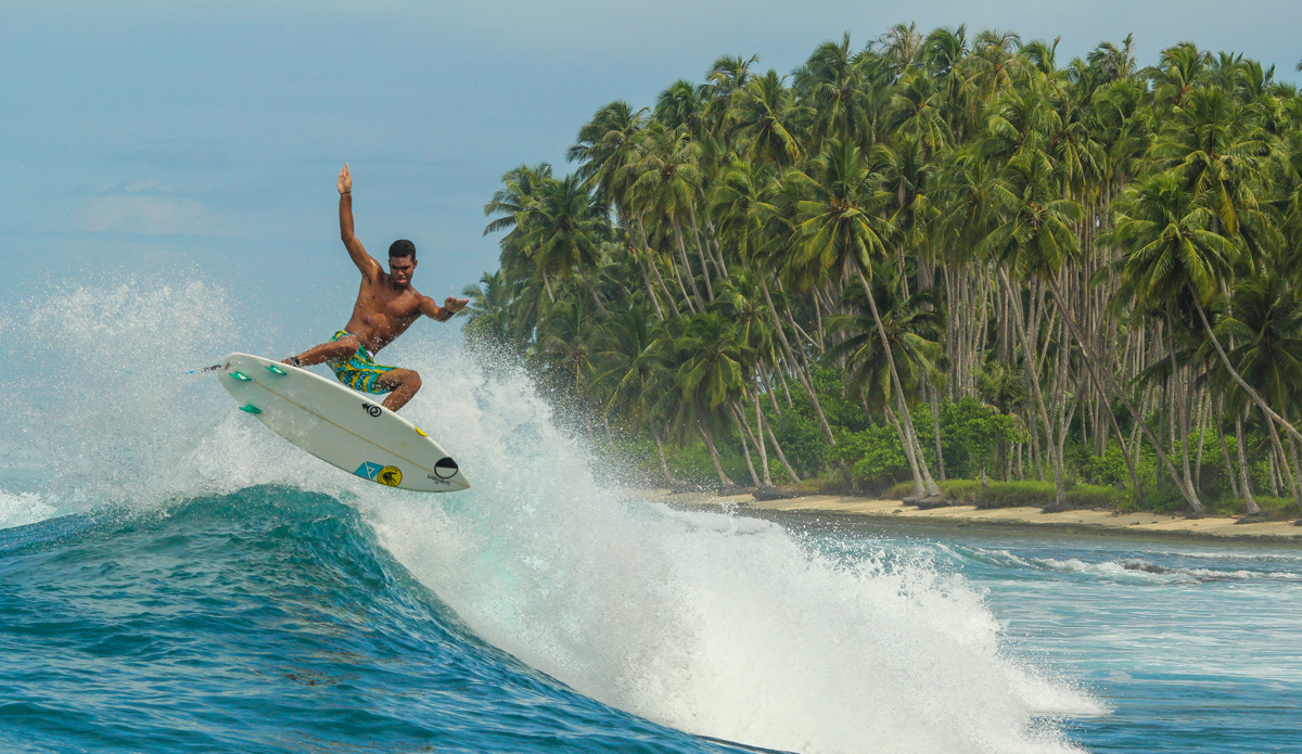 surfing on the islands near indonesia