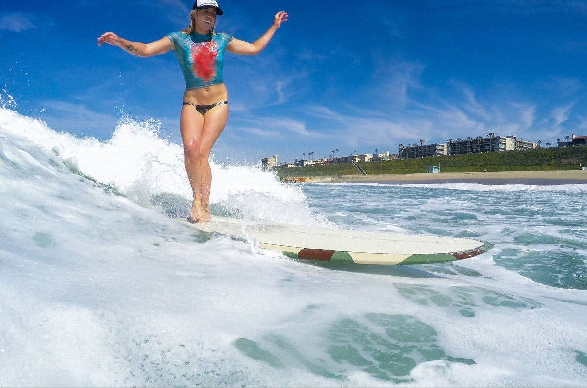 surfing with painted-on bathing suits